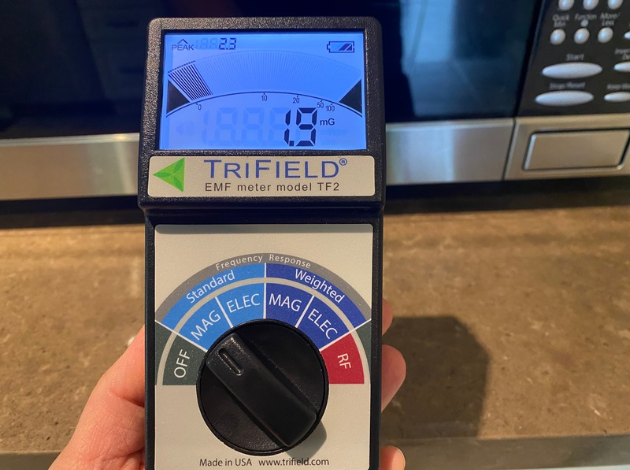 Gauss meter reading a running microwave oven at 2 inches